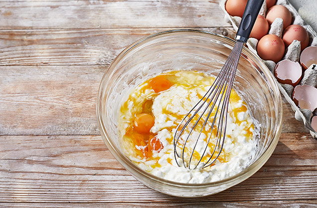 Mix eggs and cheese
