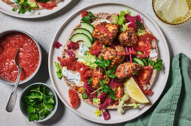 Chicken kebabs with homemade chilli sauce and flatbreads