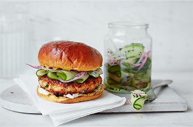 Asian-spiced salmon burgers with pickled cucumber