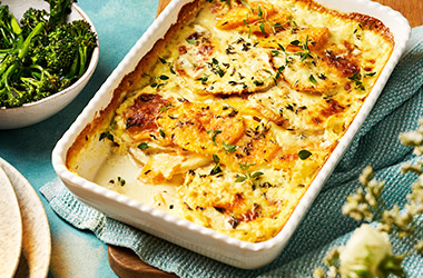 Cheesy celeriac and squash gratin