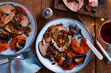 Chorizo-stuffed beef with roasted garlic sauce