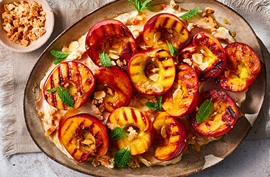 Griddled nectarines with mascarpone and amaretti crumb