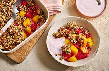 Mango and coconut breakfast crumble