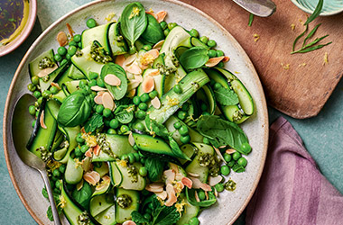 Marinated courgette ribbons with peas and mint