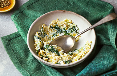 Melted leeks with spinach and basil ricotta