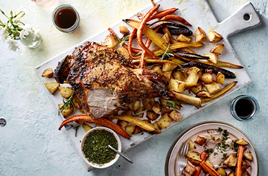 Salted honey and rosemary lamb with roasties and rainbow carrots