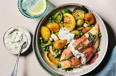 Prosciutto-wrapped chicken with spring veg