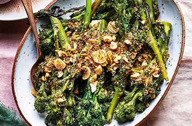Purple sprouting broccoli with cashew crumbs