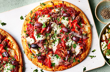 Red pepper and anchovy pizzas