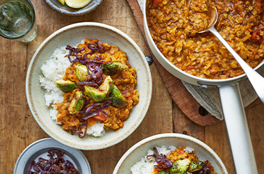 Red lentil and carrot dhal with spiced sprouts