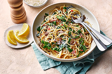 Spaghetti with greens and anchovies