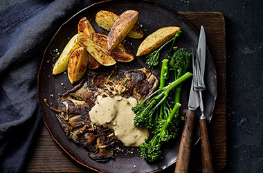 Vegan 'steak' and chips with peppercorn sauce