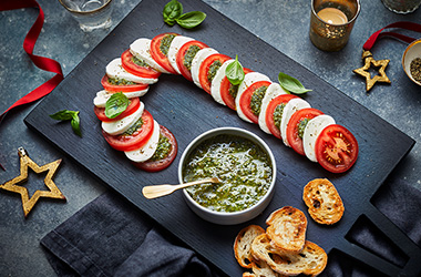 Tomato, mozzarella, and pesto candy cane