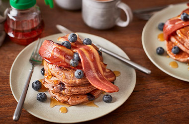Vegan blueberry pancakes with crispy meat-free bacon