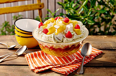 Coconut, mango and raspberry trifle