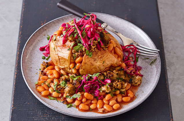Jacket potatoes with fennel sausage and beans
