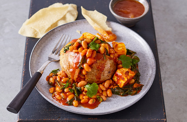 Jacket potatoes with curried beans and paneer