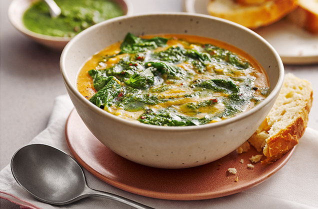 Red lentil soup with chimichurri drizzle