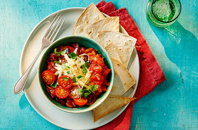 Quick bean chilli bowl with tortillas and cherry tomato