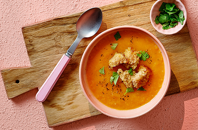 Carrot and coriander soup with bun croutons