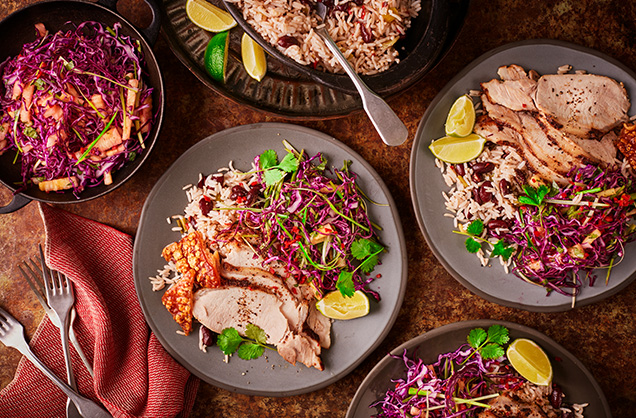 Jerk roast pork with rice and peas and pineapple slaw