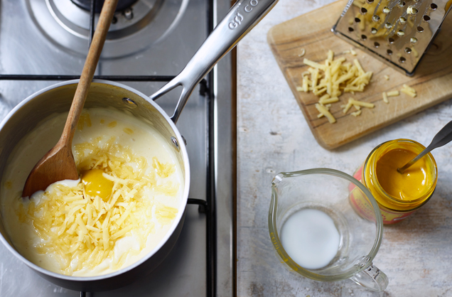 Add the milk and cheese