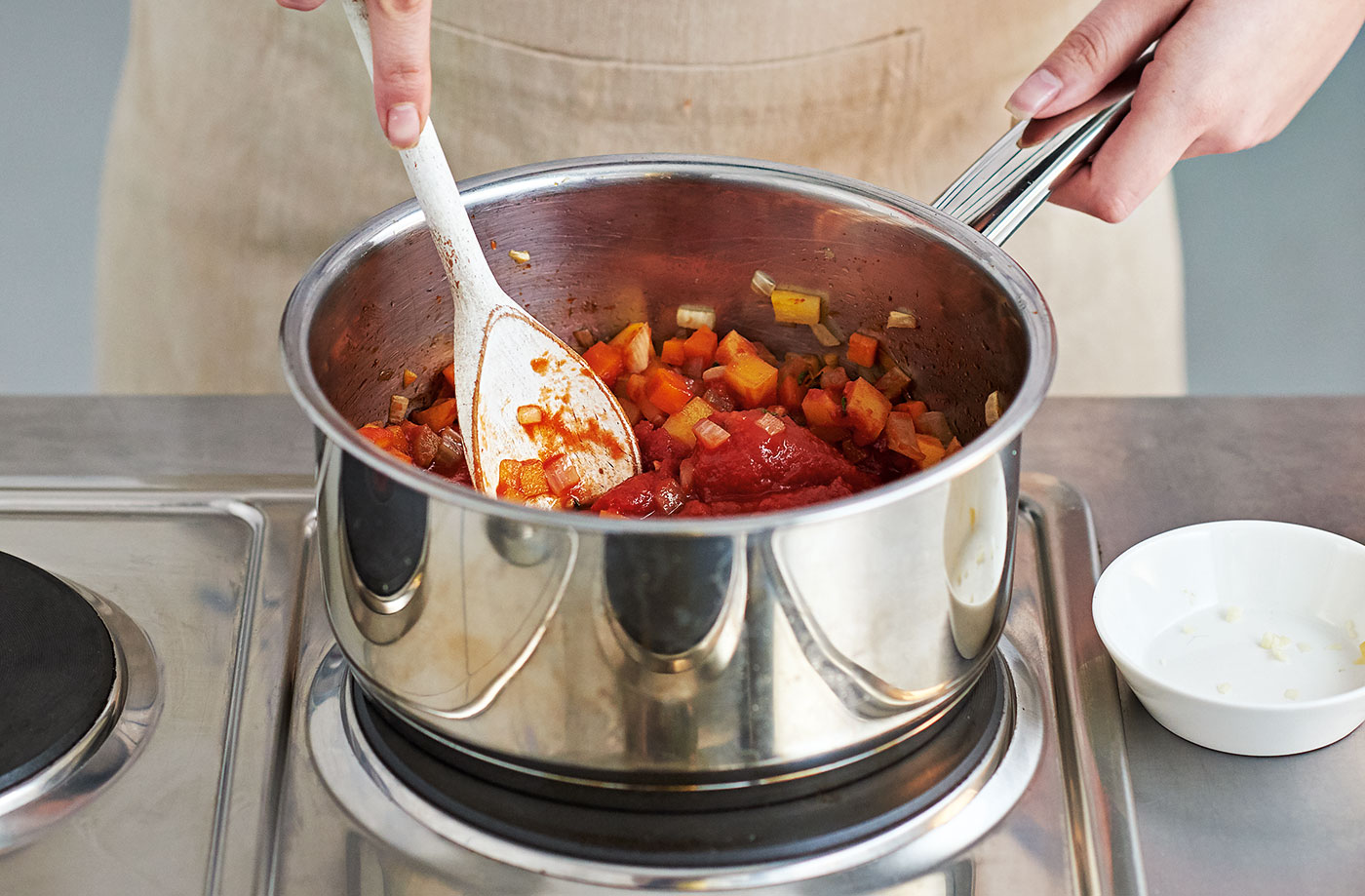 Add the liquid, beans and pasta