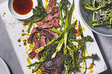 Griddled steak and purple sprouting broccoli with sticky mango sauce