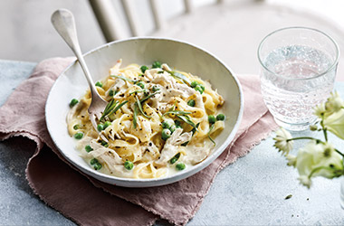 Milk-poached chicken with peas and pasta