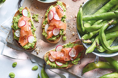 Salmon, smashed avocado and broad bean bruschetta