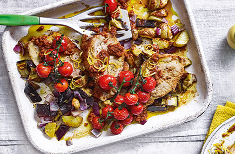 Tomato coated pork traybake with potatoes