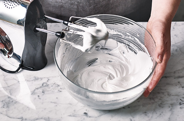 Mix in the sugar slowly