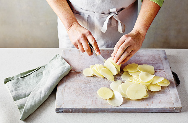 Slice the potatoes