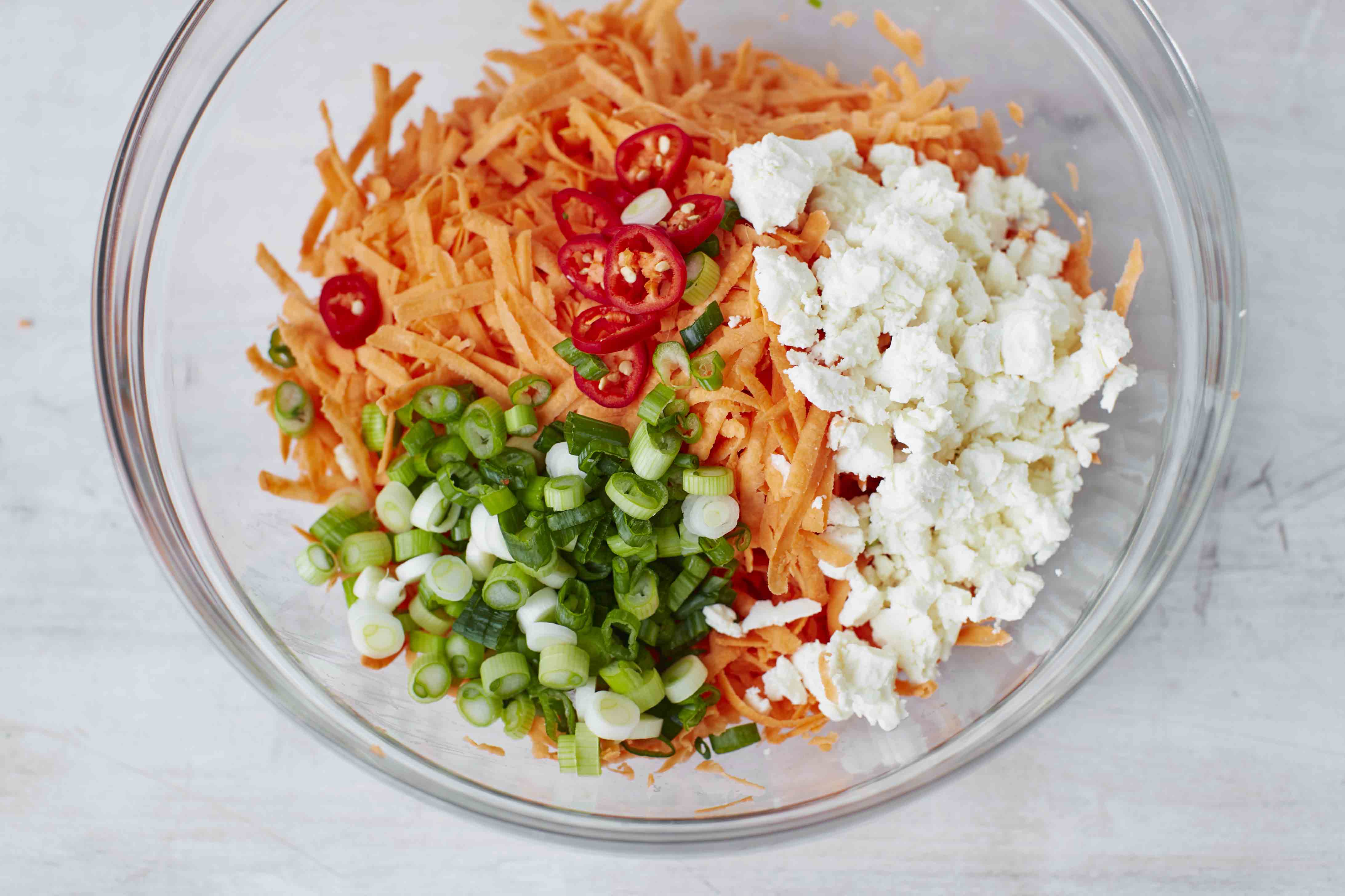 Add feta, chilli and spring onions