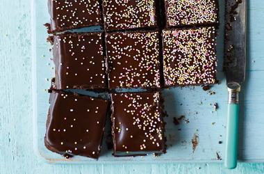 Frosted brownies with hundreds and thousands